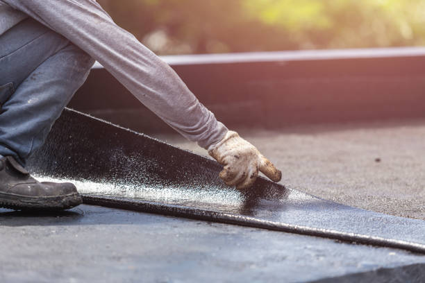 Professional Waterproofing technician working in Akron, PA